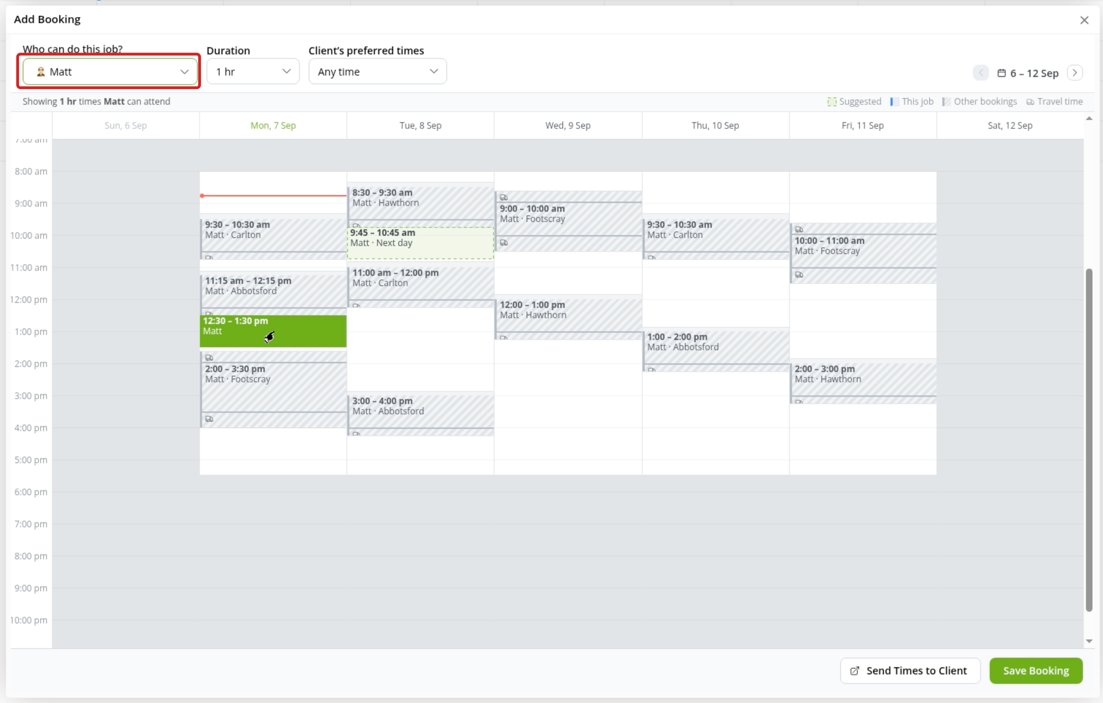 One staff member selected, with existing bookings, travel time and a proposed booking visible